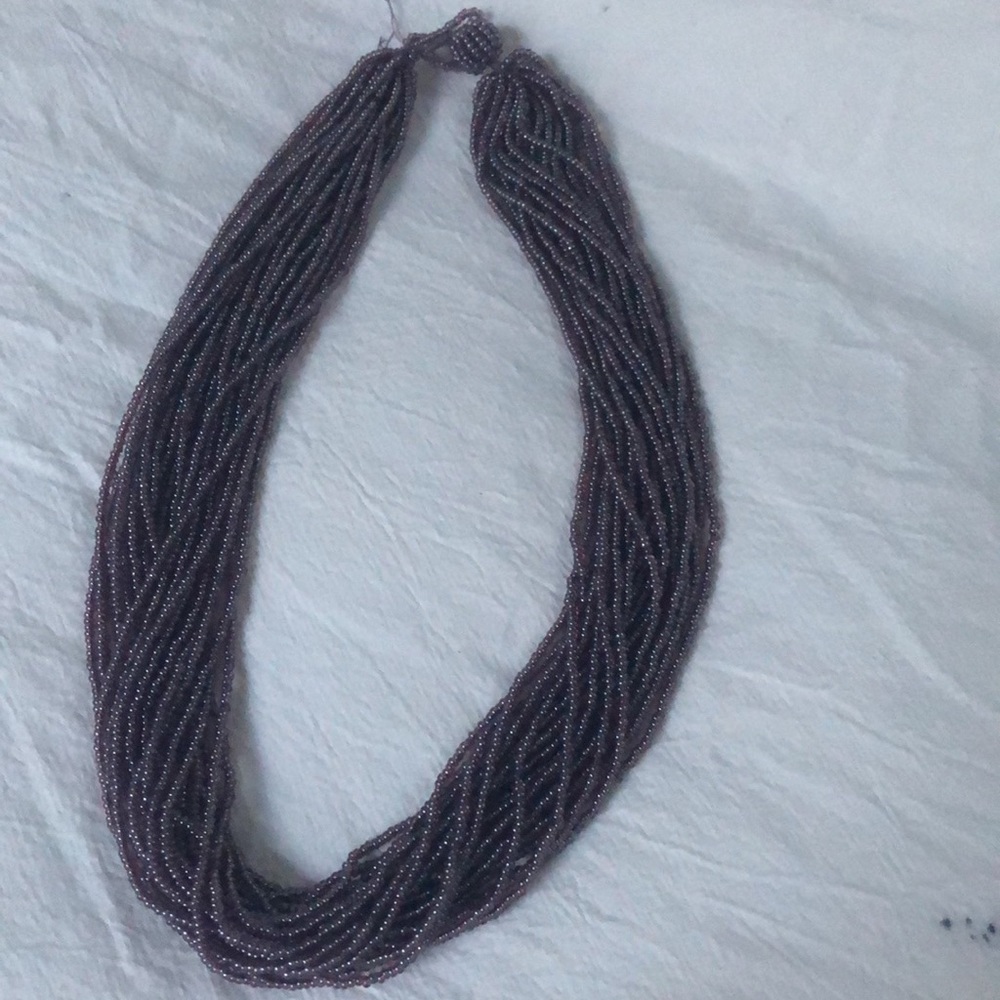 Purple color Strands of beads necklace